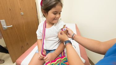 kinderen laten inenten